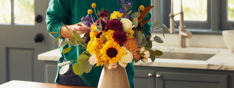 Close up of a bouquet featuring magnolia leaves
