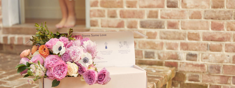 Close up of an UrbanStems box opened after being delivered for Mother's Day.
