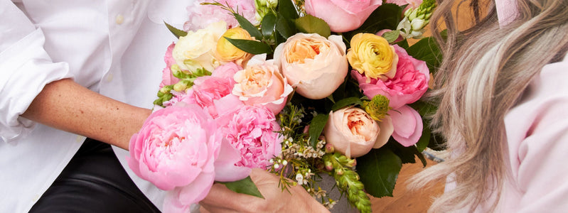 Daughter gifting her mom UrbanStems mother's Day flowers for 2023