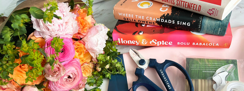 A flower bouquet and stack of books for a diy project