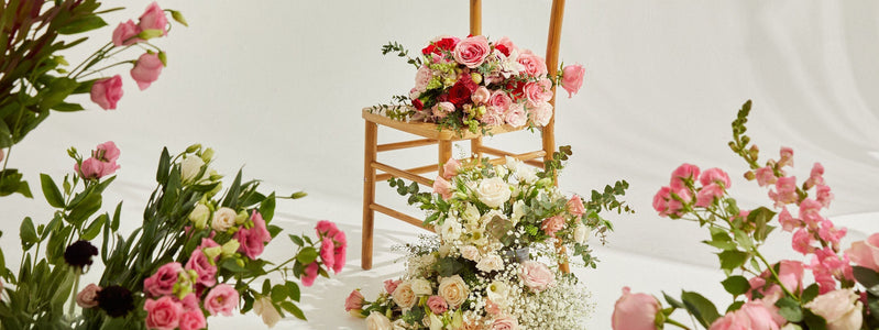 Chair surrounded by Valentine's Day Flowers available for delivery